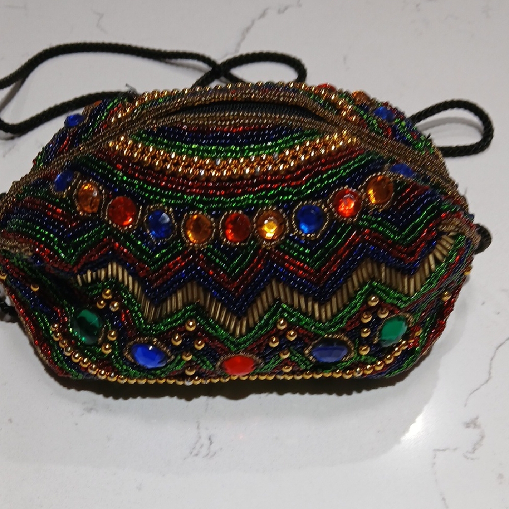 Elegant Black and Gold Wristlet with Traditional Embroidery